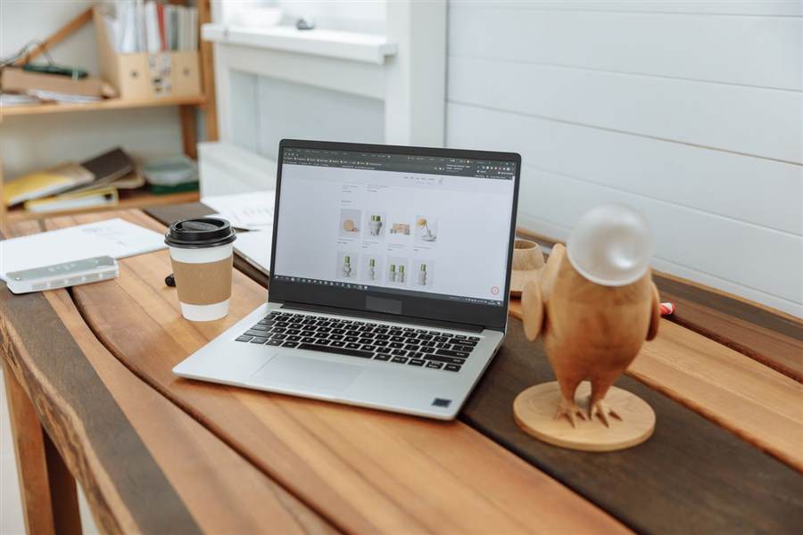 Laptop displaying a business website for ongoing management
